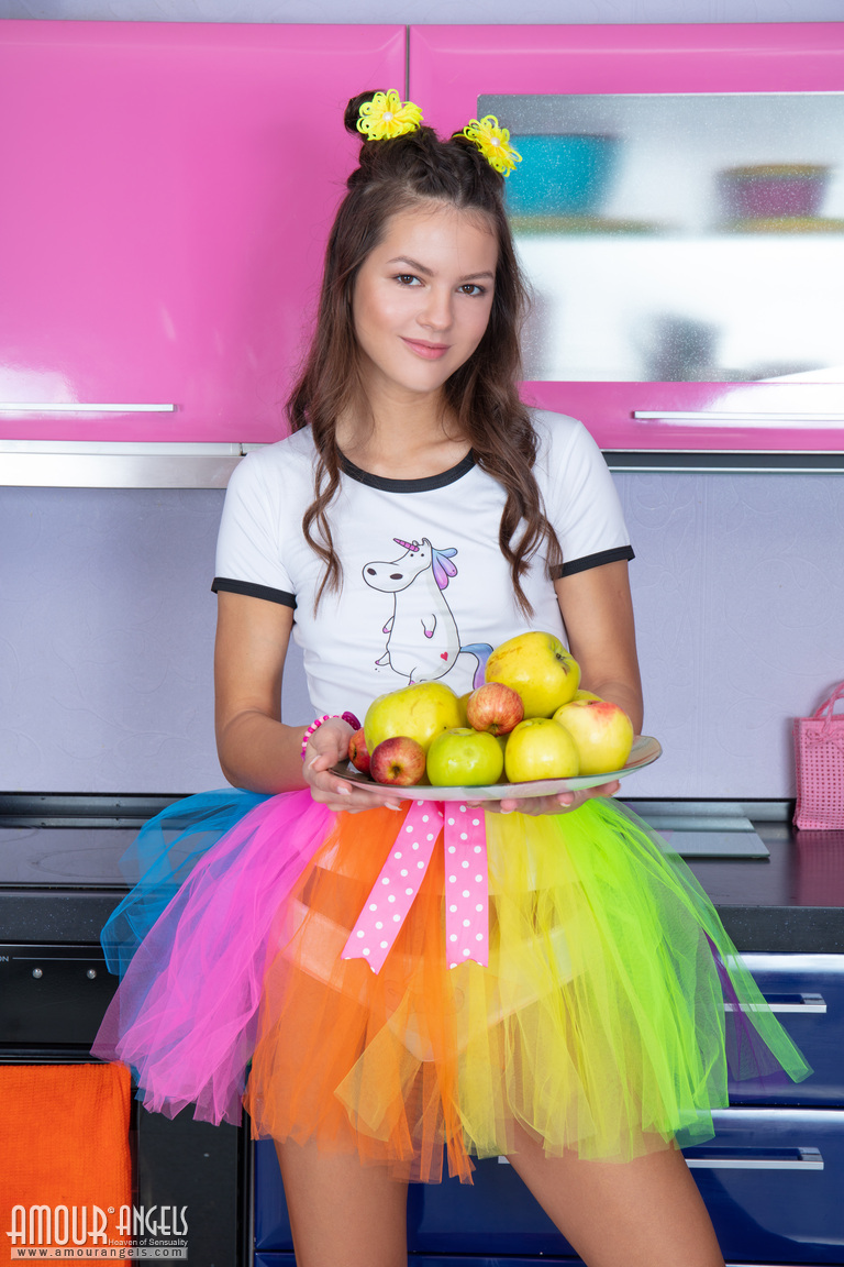 Lotus: COLORS OF RAINBOW. Model in a colorful skirt