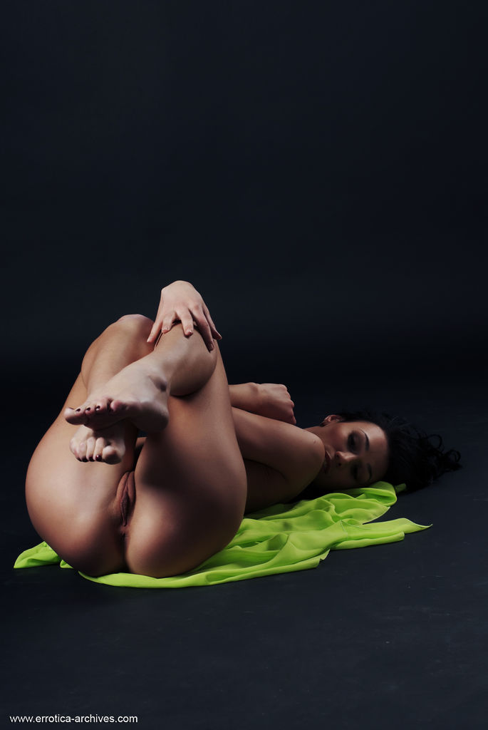 The black background accentuates Magda A's beauty as she poses fully nude.