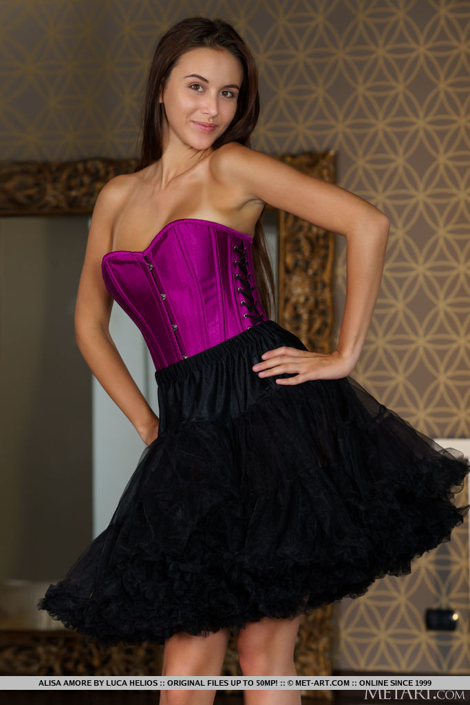 Alisa Amore looks elegant in her purple corsette paired with black tutu skirt. She decides to take it off and reveal a beautifully tanned skin slender figure underneath and hairless kitty.