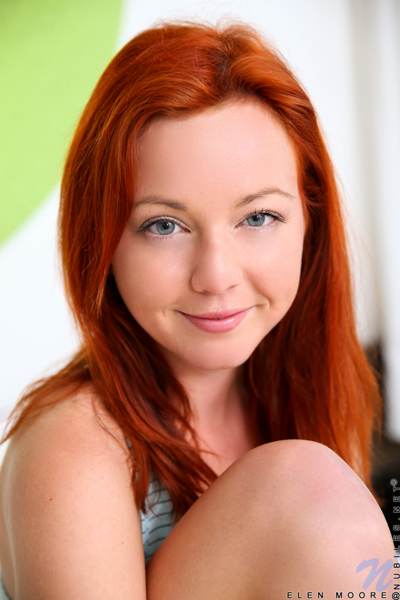 European sweetheart Elen Moore does tousled bed head perfectly with her sensual smiles and her luscious red hair