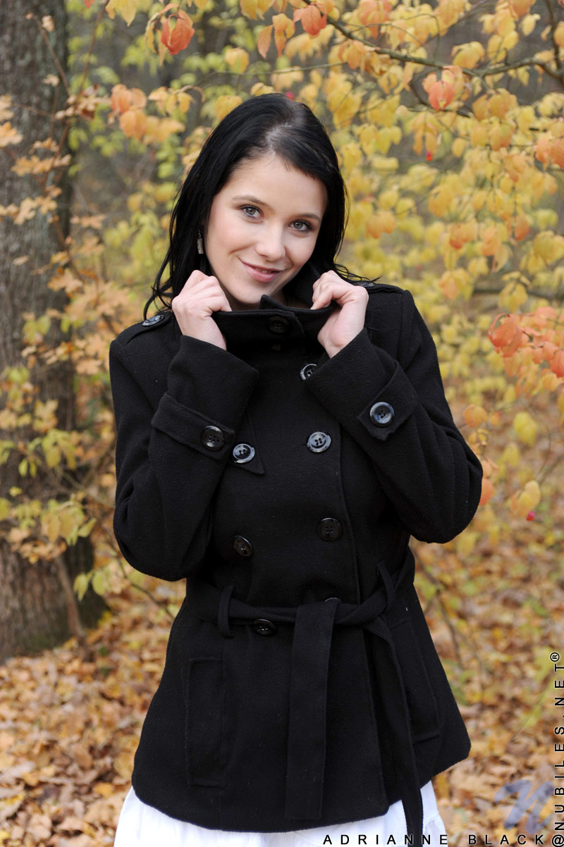 Beautiful Nubile Adrianne Black looks sexy outdoors on an autumn day