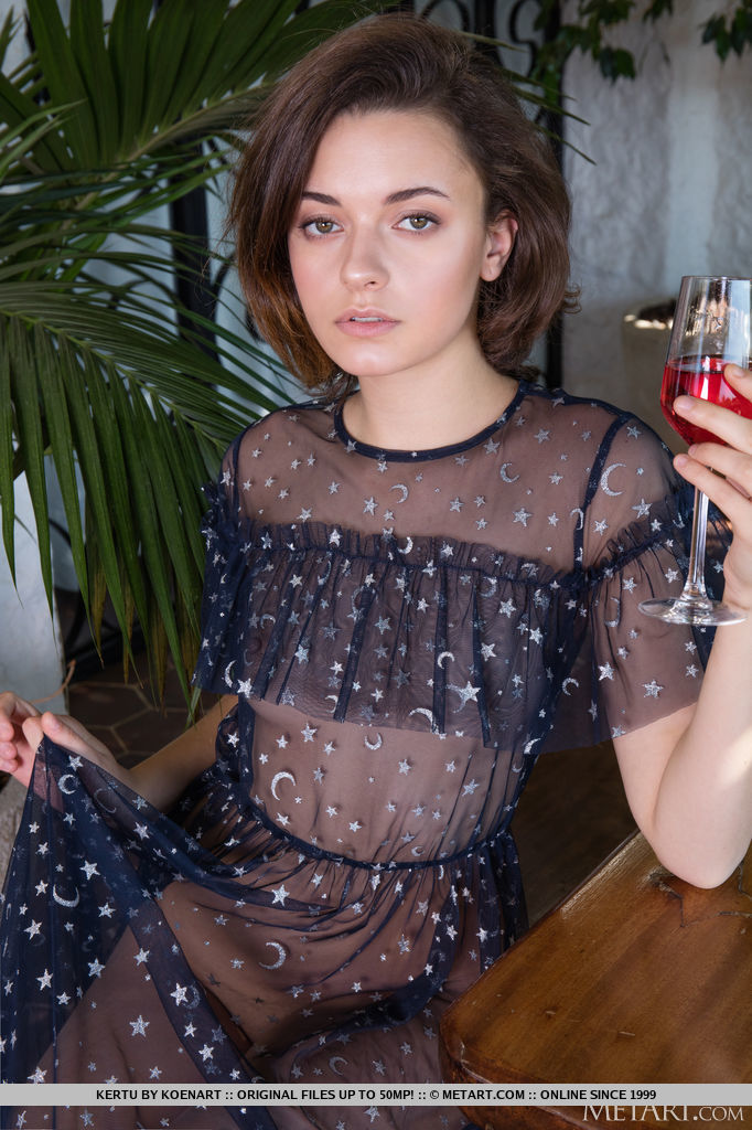 Stunning Kertu sips a glass of red punch in the lanai and decides to strip off her see through dress and flaunts her bootylicious figure and smooth punani on the table.