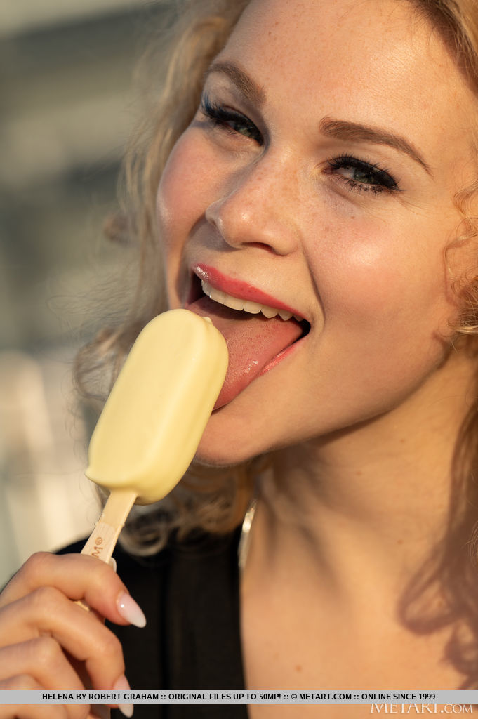 Gorgeous blonde Helena leads you indoors, untying her string bikini top to bare her perky breasts, her puffy nipples swelling between her fingertips.