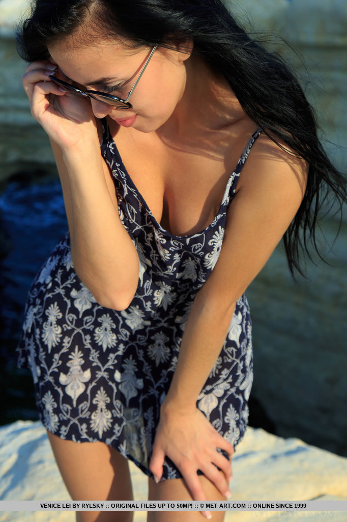 Venice Lei poses outdoors as she flaunts her hairy, meaty pussy.