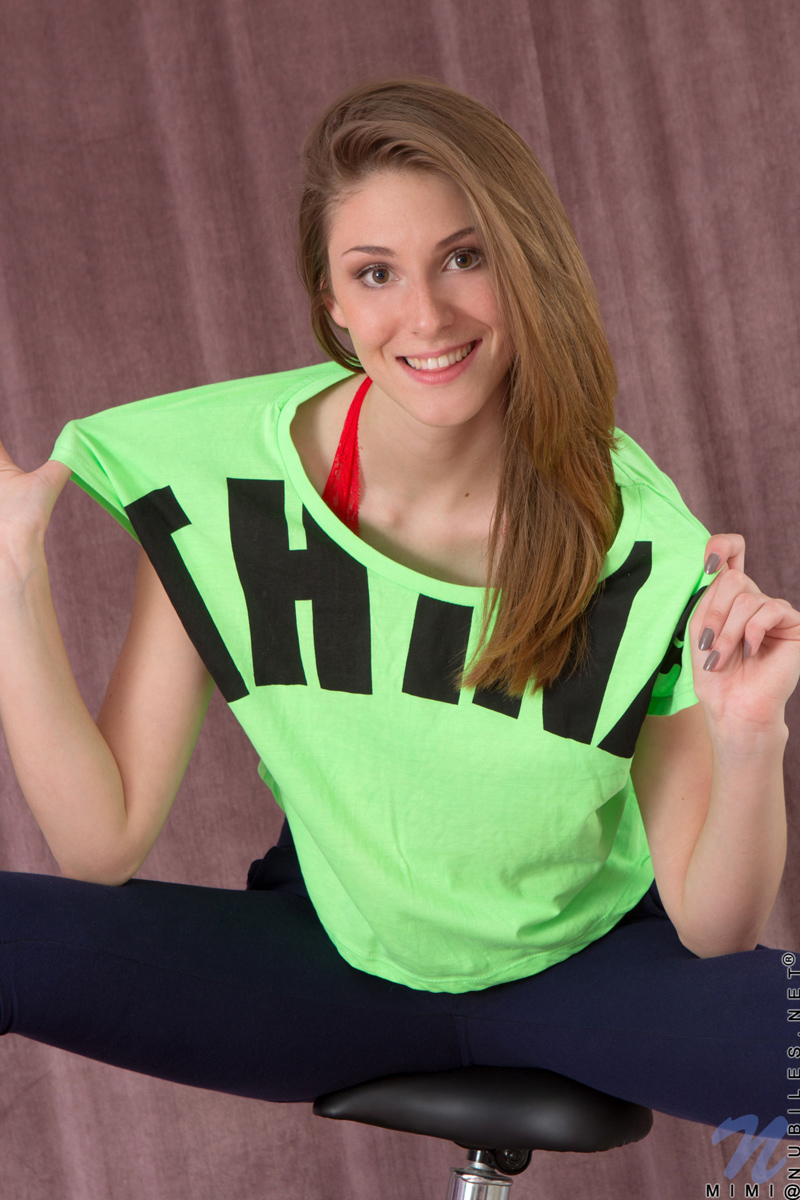 Bright red lingerie is stunning as it hugs Mimi's curves from her lush ass to her medium tits