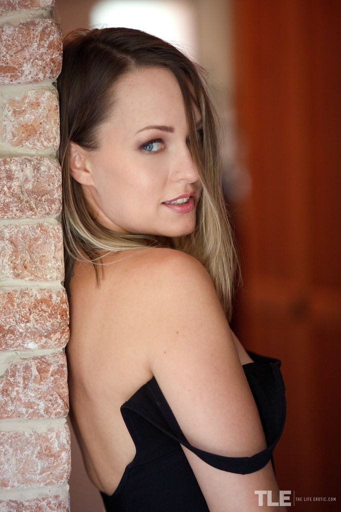 Gorgeous babe Blue Angel happily buzzed from drinking sparkling wine, she splays her thighs to expose shaved pussy lips then grabs the bottle as she grinds the smooth glass neck against her slit.