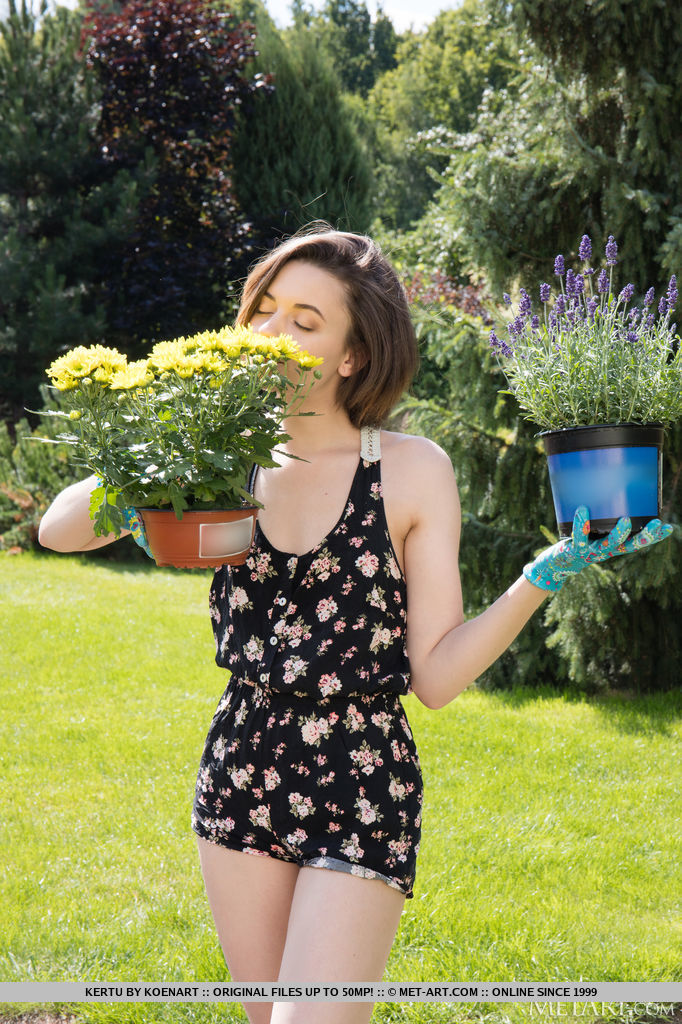 Kertu tends to her garden and decides to remove her clothes and flaunts her slender physique and smooth pinkish coochie.