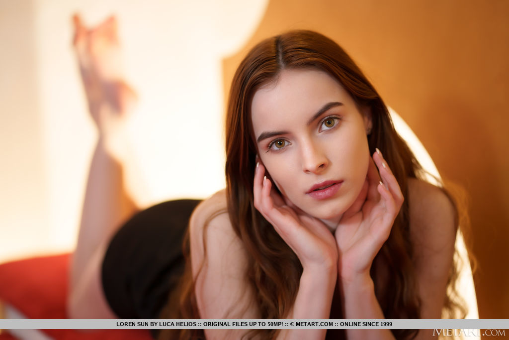 Loren Sun get naked on the velvet red couch and showcase her smooth, porcelain skin, tender breasts, slim waist, and suckable clit.