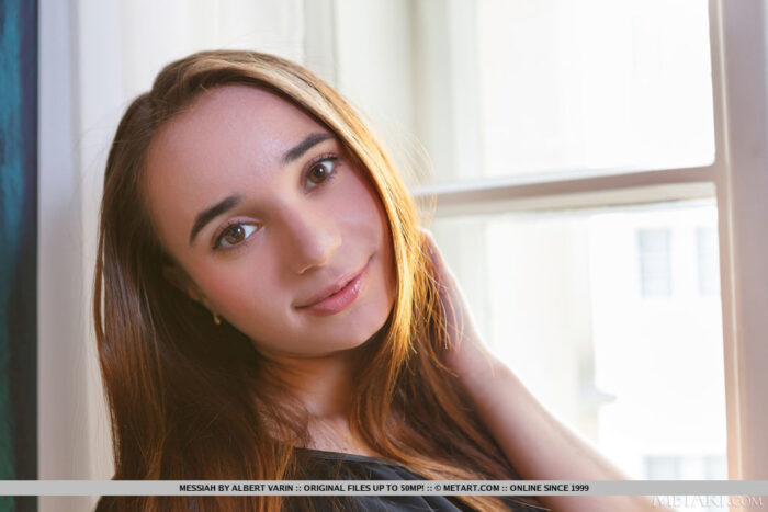 Cute brunette Messiah invites you to join her in the bedroom, her huge brown eyes full of passion as she peels off her long socks and rolls around naked, hands roaming over her sexy small breasts and curvaceous ass.