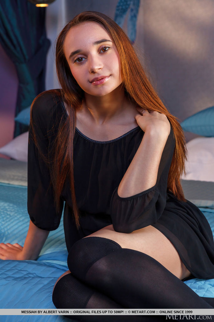 Cute brunette Messiah invites you to join her in the bedroom, her huge brown eyes full of passion as she peels off her long socks and rolls around naked, hands roaming over her sexy small breasts and curvaceous ass.