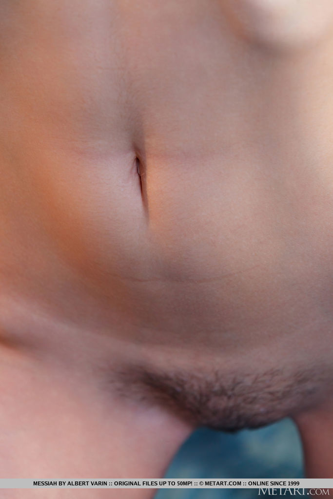 Cute brunette Messiah invites you to join her in the bedroom, her huge brown eyes full of passion as she peels off her long socks and rolls around naked, hands roaming over her sexy small breasts and curvaceous ass.