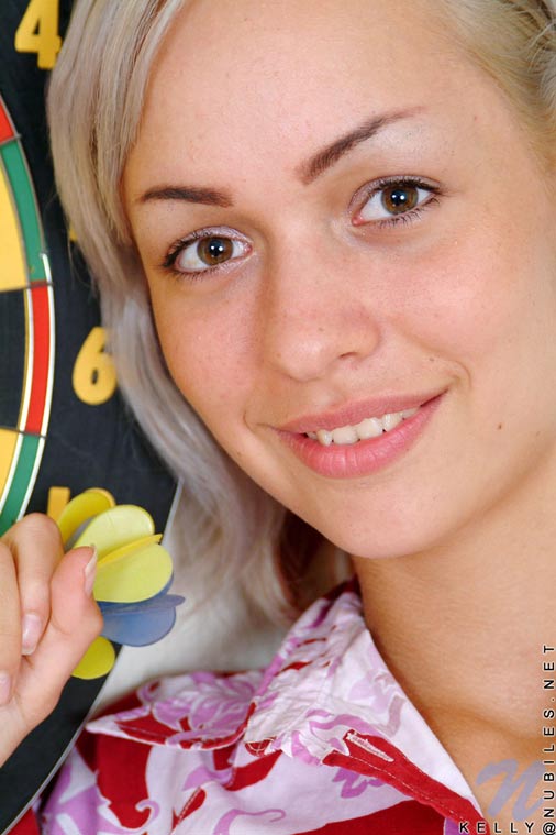 Anyone up for a game of darts with a cute blond teenie girl getting naked and throwing bullseyes
