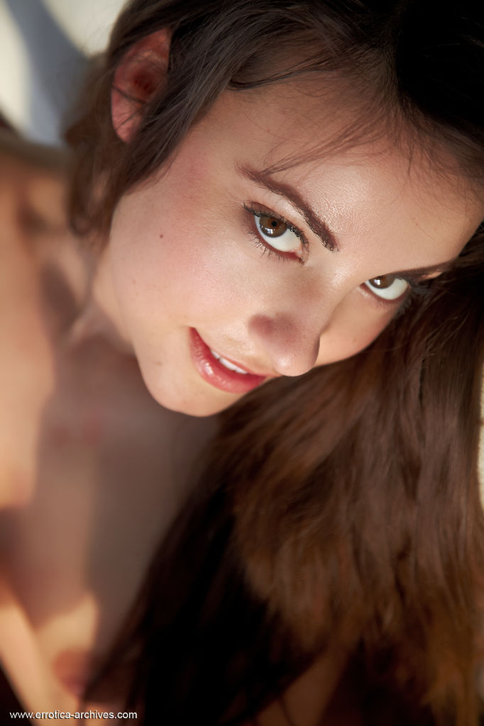 Top model Lorena bares her sexy, tight body with small tits and pink pussy.