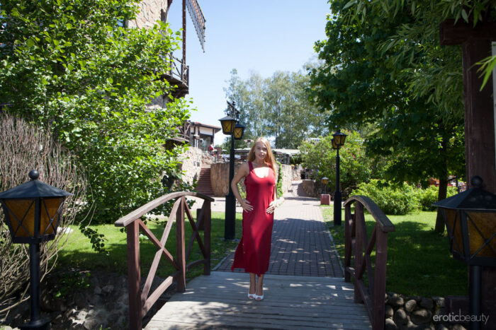 Sarika A takes pictures on tourists spots in the town. She then unclasps the buttons of her red maxi dress in the studio and flaunts her juicy melons and manicures coochie.